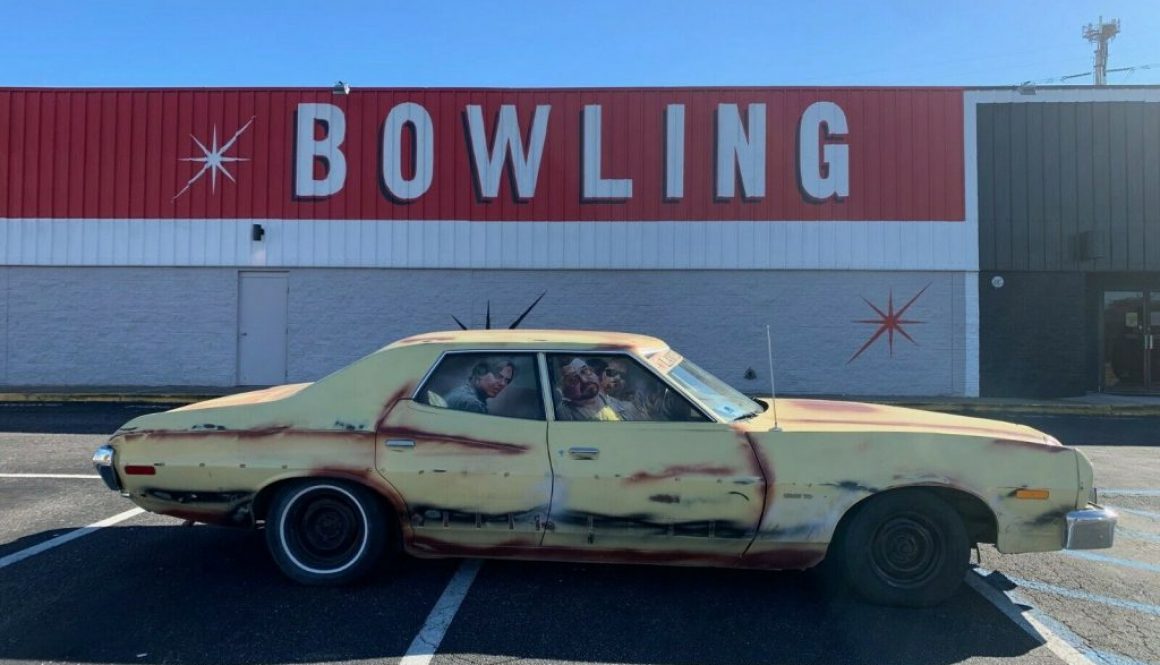 A picture of the Dude's car next to a bowling alley. Source: https://dailyturismo.com/tag/the-big-lebowski/